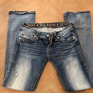 Rock Revival Women's Faded Blue Boot Cut Jeans. 106